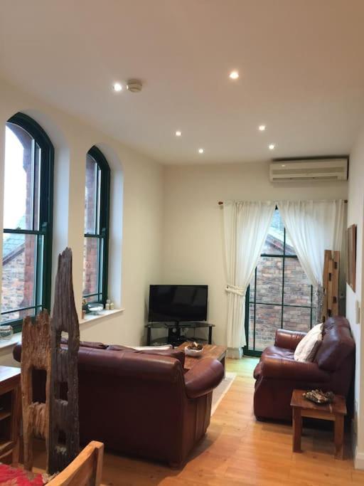 Converted Chapel Floor To Ceiling Arch Window