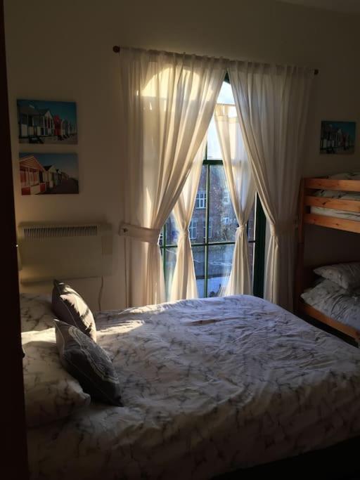 Converted Chapel Floor To Ceiling Arch Window Апартаменты